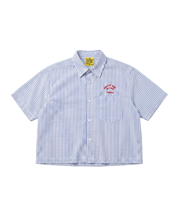 A short-sleeve button-up shirt with vertical blue and white stripes, featuring a red embroidered 'WATER THE PLANT TOKYO' house logo on the left chest pocket. The shirt is laid flat against a clean white background.