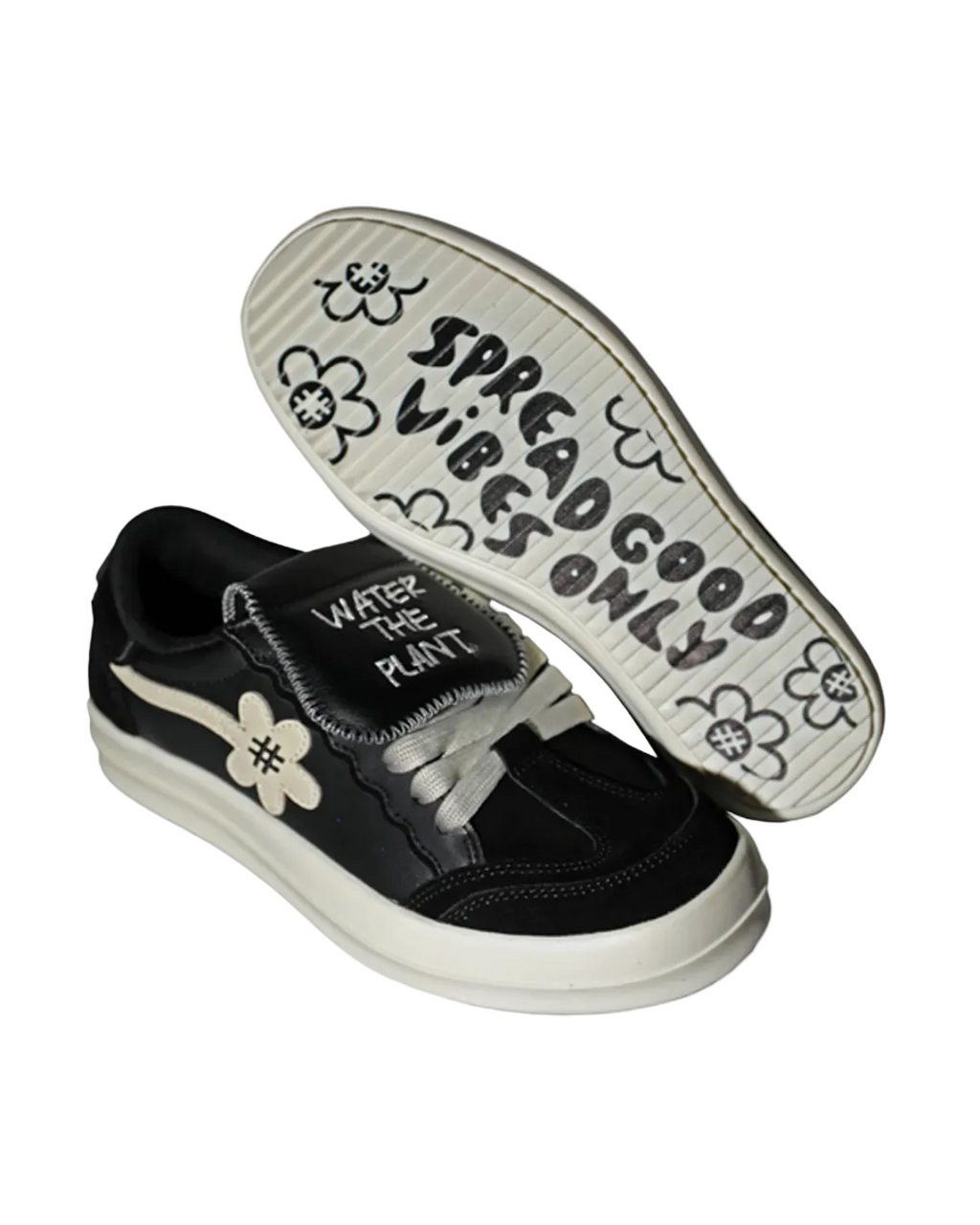 Black sneakers with white soles and text on a white background