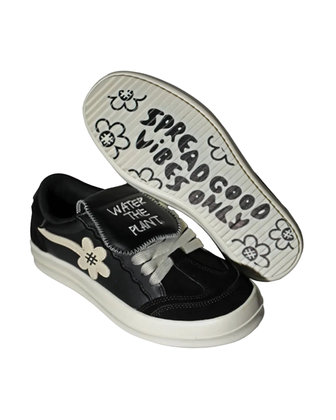 Black sneakers with white soles and text on a white background