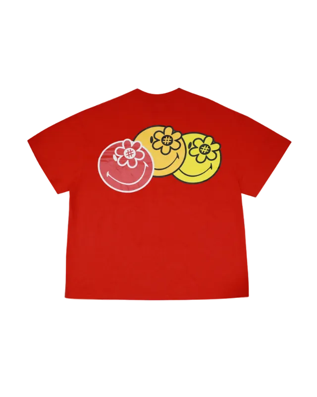 Red t-shirt with colorful smiley® face design on a white background