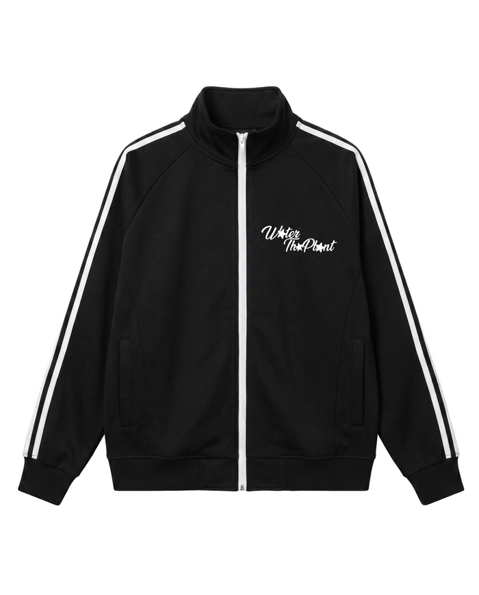 A black track jacket with white double stripes down the sleeves and a white script logo on the left chest reading 'WATER THE PLANT', displayed on a clean white background.