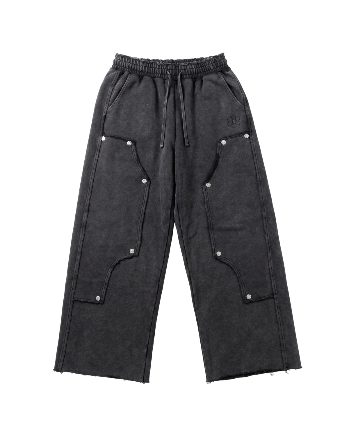Black pants with button details on a white background