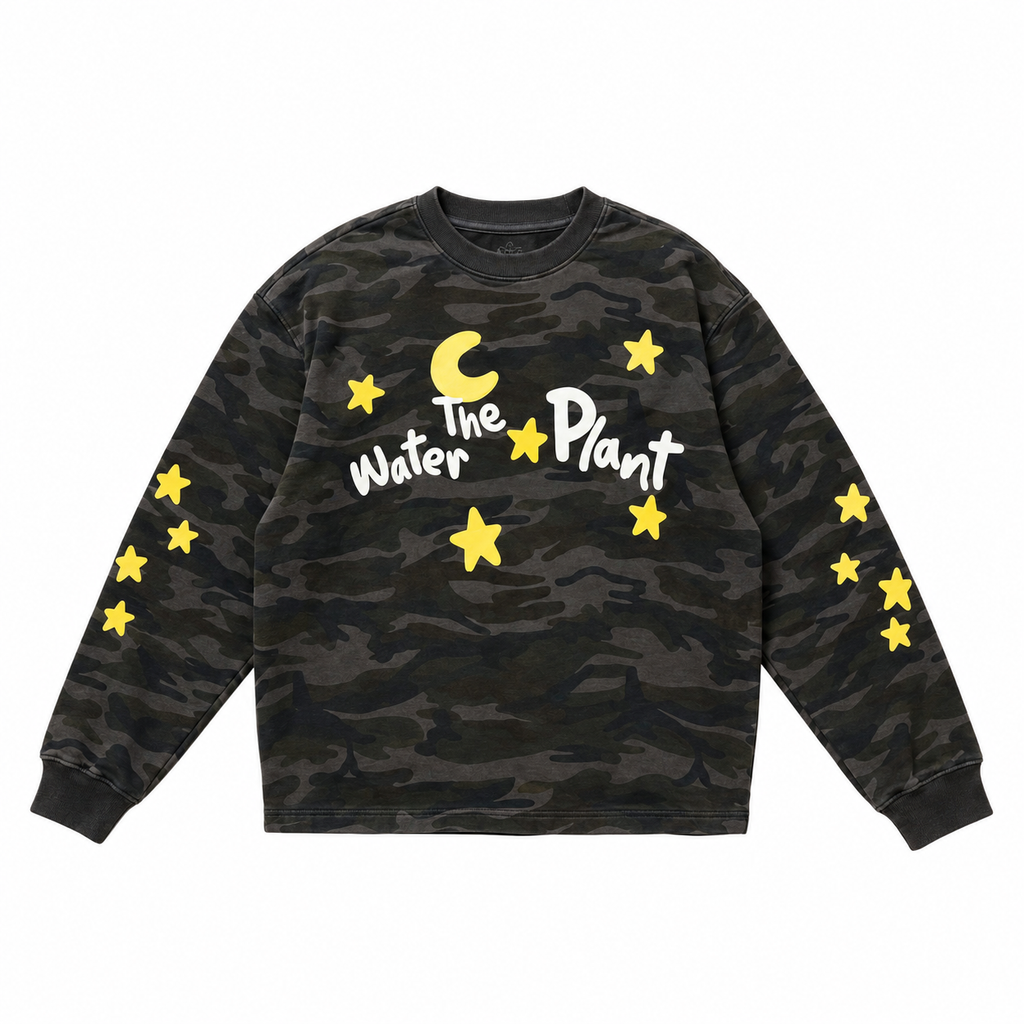 A dark camouflage crewneck sweatshirt featuring yellow stars and the text 'Water The Plant' in white across the chest, displayed on a solid white background.