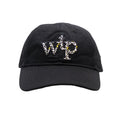 A black baseball cap featuring an embroidered 'WTP' logo on the front, where the letters are filled with a leopard print pattern in black, beige, and yellow.