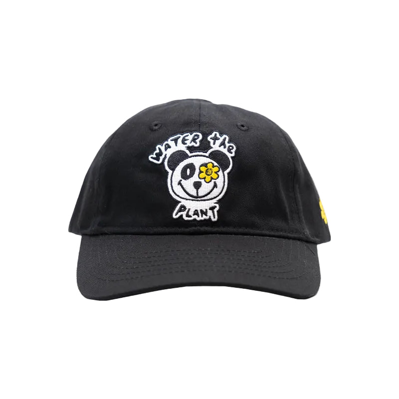 A black baseball cap featuring a white embroidered panda face with a yellow flower in its eye and the text 'WATER THE PLANT' in white and yellow.