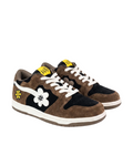 Pair of brown and black sneakers with white soles on a white background