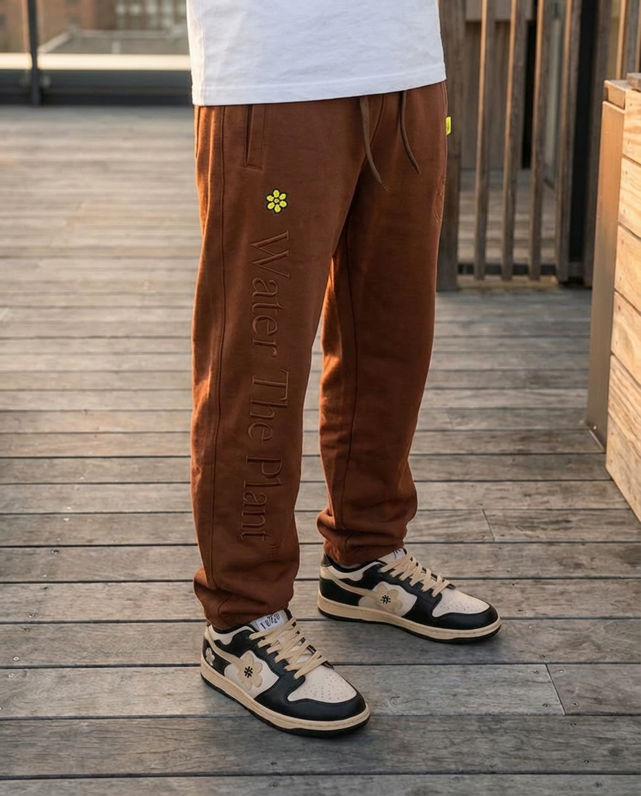 MELTING SMILEY TRACK PANTS | BROWN